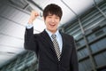 Happy young Asian business man Royalty Free Stock Photo
