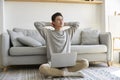 Happy young asian business man working at home using laptop computer Royalty Free Stock Photo