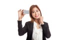 Happy young Asian business woman with a blank card Royalty Free Stock Photo