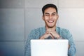 Happy Young Asian Businessman Working on Computer Laptop Royalty Free Stock Photo