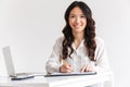 Happy young asian businesswoman taking notes Royalty Free Stock Photo