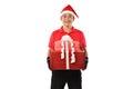 Happy young Asian delivery man in red uniform, Christmas hat carry boxes of presents in hands isolated on white background during