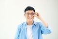 Happy Young Asian man smiling wearing glasses, isolated on white background Royalty Free Stock Photo