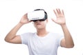 Happy young asian man using the virtual reality headset isolated Royalty Free Stock Photo