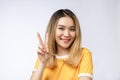Happy young asian woman showing two fingers or victory gesture with blank copyspace area for text,Portrait of beautiful Royalty Free Stock Photo