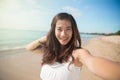 Happy young Asian woman take photos, smile to camera Royalty Free Stock Photo