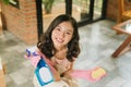 Happy young asian woman wiping floor Royalty Free Stock Photo