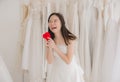 Happy young beautiful bride asian woman smiling and hand holding model red heart Royalty Free Stock Photo