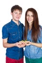 Happy Young beautiful Couple isolated on a White background with gift in hand Royalty Free Stock Photo