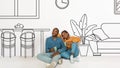 Happy young black couple enjoy cups of coffee, dreams of house, buy own home, in living room with drawn furniture