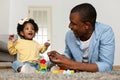 Happy Young Black Father Playing Together With Little Baby Daughter Royalty Free Stock Photo