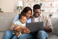 Portrait of black family using tablet at home Royalty Free Stock Photo