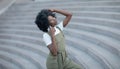 Happy young black woman calling by mobile phone outdoors in the city Royalty Free Stock Photo