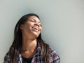 Happy young black woman laughing outdoors Royalty Free Stock Photo