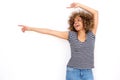 Happy young black woman pointing fingers to the side Royalty Free Stock Photo