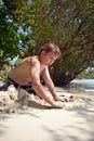 Happy young boy is digging Royalty Free Stock Photo