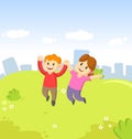 Happy cartoon young boy and girl kids jumping for joy with their hands in the air on city and blue sky background. Royalty Free Stock Photo