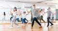 Happy young boy and glad girls hip hop dance Royalty Free Stock Photo