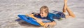 Happy Young boy having fun at the beach on vacation, with Boogie board BANNER, LONG FORMAT Royalty Free Stock Photo