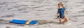 Happy Young boy having fun at the beach on vacation, with Boogie board BANNER, LONG FORMAT Royalty Free Stock Photo