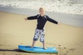 Happy Young boy having fun at the beach on vacation, Royalty Free Stock Photo