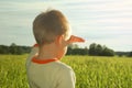 Happy young boy looking horizon and dreaming Royalty Free Stock Photo