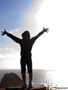 Happy, Young Boy Looking Over the Ocean Royalty Free Stock Photo