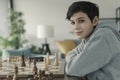 Happy boy playing chess at home Royalty Free Stock Photo