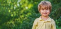 Happy young boy. Portrait of adorable happy little boy smiling. Little funny blond boys. Portrait of happy joyful little Royalty Free Stock Photo