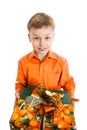 Happy young boy with a present box smiles isolated Royalty Free Stock Photo