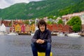 Happy young boy smiling at camera in Bergen city Royalty Free Stock Photo