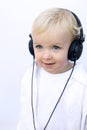 Happy young boy wearing headphones