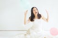 Happy young bride asian woman smiling with colorful balloons Royalty Free Stock Photo