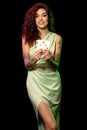 Happy young brunette demonstrating set of winning pair of aces Royalty Free Stock Photo