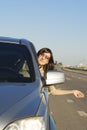 Happy young brunette driving car Royalty Free Stock Photo