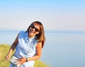 Happy young brunette woman open smile by the sea Royalty Free Stock Photo