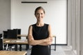 Happy young business leader woman standing in office Royalty Free Stock Photo