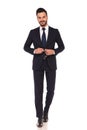 Happy young business man closing his suit and smile Royalty Free Stock Photo