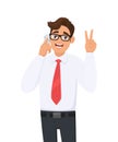 Happy young business man in formal speaking/talking on the mobile, cell or smart phone. Male character gesturing or making victory Royalty Free Stock Photo