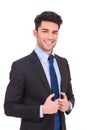 Happy young business man holding his collar Royalty Free Stock Photo