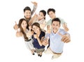 Happy young business team with thumbs up gesture Royalty Free Stock Photo