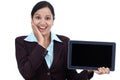 Happy young business woman showing tablet Royalty Free Stock Photo