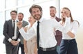 happy young businessman on business team background. Royalty Free Stock Photo