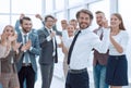 happy young businessman on business team background. Royalty Free Stock Photo