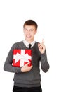 Happy young businessman holding a gift box Royalty Free Stock Photo