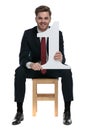 Happy young businessman holding number one sign Royalty Free Stock Photo