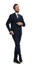 Happy young businessman in navy blue suit smiling Royalty Free Stock Photo