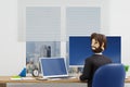 Happy young businessman relaxing working in office, 3D rendering