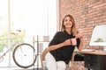 Happy young businesswoman with cup of coffee Royalty Free Stock Photo