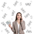 Young businesswoman holding American dollars and talking on phone against white background with drawn money Royalty Free Stock Photo